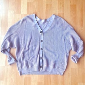 Beautiful button cardigan. Wear 2 ways (buttons in front or back). Size M.